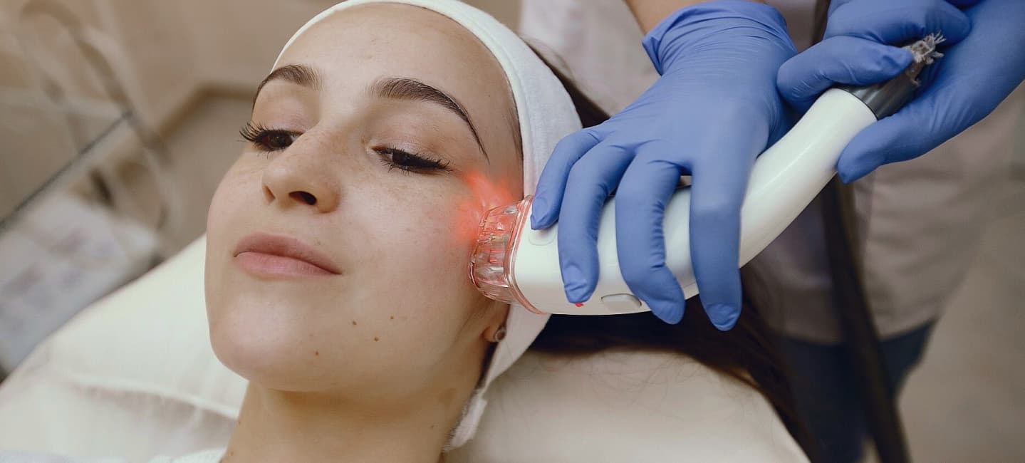 A client receiving laser skin rejuvenation treatment